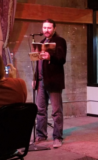 Reading from Where There Is Ruin -- yes, that's my proof copy of the chapbook!